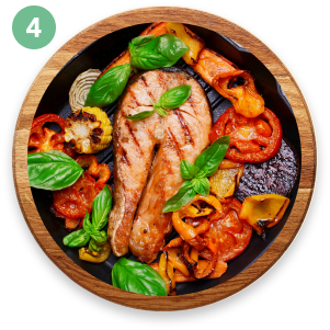 Pescado a la plancha con vegetales al horno o salteados.